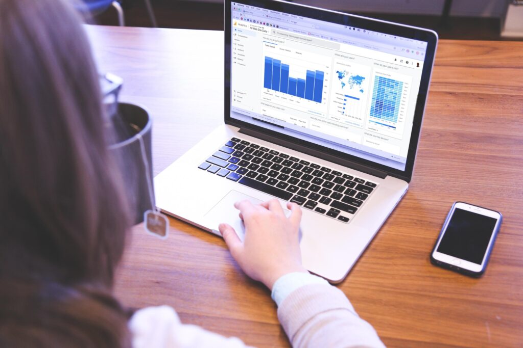 Gen Z student managing personal finances with AI tools on phone